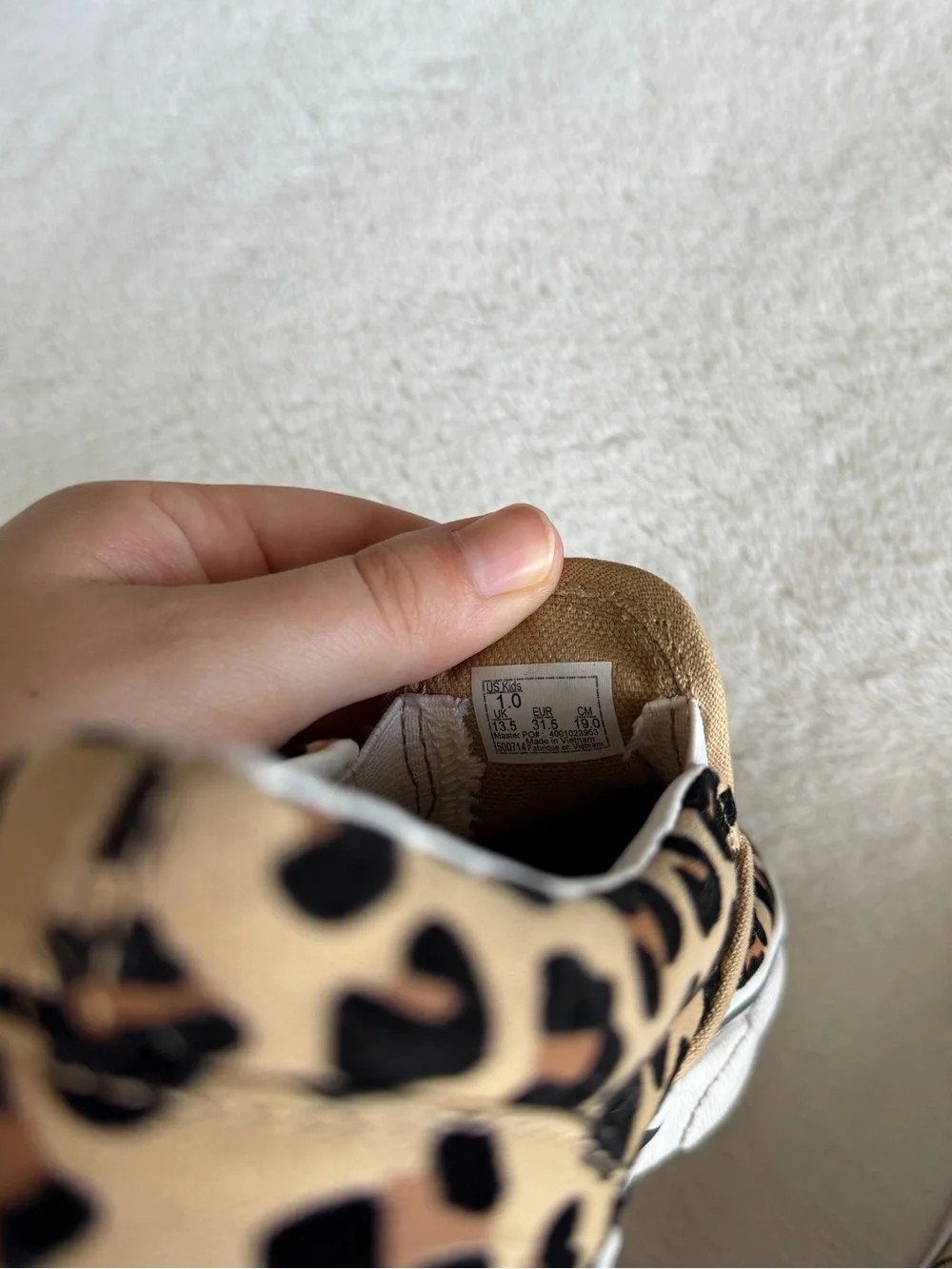 Vans Kids Slip-On Sneakers in Leopard Print